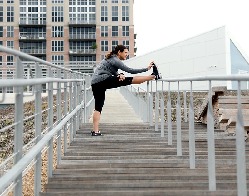 TLC patient stretching on walkway